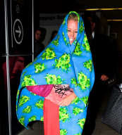 Kendra Wilkinson Hides Under a Frog Blanket