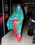Kendra Wilkinson Hides Under a Frog Blanket