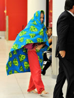 Kendra Wilkinson Hides Under a Frog Blanket