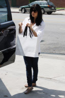 Selma Blair Brings Victoria Beckham A Gift