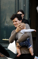 Miranda Kerr, Orlando Bloom and their baby boy Flynn strolling in Paris during Paris Fashion week