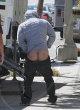 Alex Pettyfer gets cheeky on set
