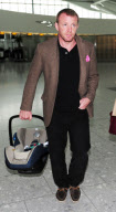 EXC GUY RITCHIE AND JACQUI AINSLEY SPOTTED  WITH THEIR BABY