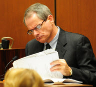A photograph from the coroner of Michael Jackson's body is projected by the prosecution