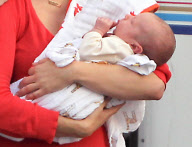 ** NO WEB USE **  *EXCLUSIVE* January Jones brings Xander to work