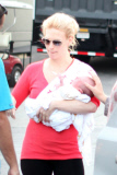** NO WEB USE **  *EXCLUSIVE* January Jones brings Xander to work