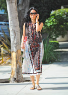 Lucy Liu Chats on her Blackberry