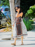 Lucy Liu Chats on her Blackberry