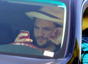 EXCLUSIVE Ashton Kutcher wearing wedding as he texts and drives