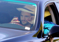 EXCLUSIVE Ashton Kutcher wearing wedding as he texts and drives