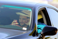 EXCLUSIVE Ashton Kutcher wearing wedding as he texts and drives