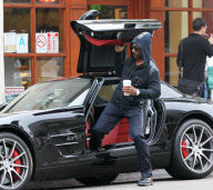 EXCLUSIVE Eddie Murphy grabs some coffee in his 2011 Mercedes-Benz SLS AMG