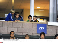 USA: Victoria Beckham and children during match