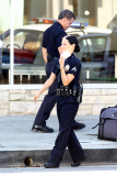 Lucy Liu suits up for "Southland" with Michael Cudlitz