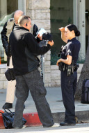 Lucy Liu suits up for "Southland" with Michael Cudlitz