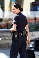 Lucy Liu suits up for "Southland" with Michael Cudlitz
