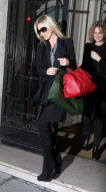 British model Kate Moss leaves Ritz hotel in Paris to go back to London