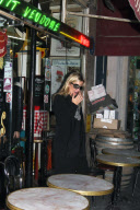British model Kate Moss leaves Ritz hotel in Paris to go back to London