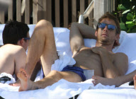Formula One Driver Jenson Button Lounges Poolside in Miami