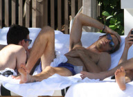 Formula One Driver Jenson Button Lounges Poolside in Miami