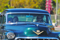 Dita Von Teese Drives Around in her Vintage Cadillac
