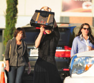 Dita Von Teese Drives Around in her Vintage Cadillac