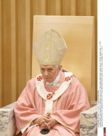 ROME: Pope Benedict XVI celebrates mass in the "Santa Maria delle Grazie" parish church, in Rome, Sunday, Dec. 11, 2011.