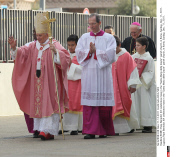 ROME: Pope Benedict XVI celebrates mass in the "Santa Maria delle Grazie" parish church, in Rome, Sunday, Dec. 11, 2011.