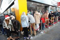 World record attempt for the World's longest swimwear queue, Virgin Holidays store, London, Britain - 13 Dec 2011