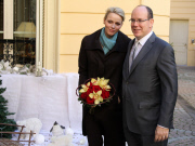 CPE/Prince Albert and Princess Charlene of Monaco giving gifts to old people at Monaco Red Cross