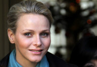 CPE/Prince Albert and Princess Charlene of Monaco giving gifts to old people at Monaco Red Cross
