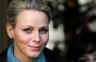 CPE/Prince Albert and Princess Charlene of Monaco giving gifts to old people at Monaco Red Cross