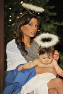 David, Victoria and Harper Seven Beckham look-a-likes promoting Alison Jackson's book 'Exposed', Harrods, London, Britain