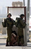 Israeli soldiers strip and blindfold suspected bomber