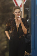 Catherine McNeil on set Smoking