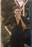Catherine McNeil on set Smoking