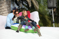 Brooke Burke Charvet and family enjoy a man-made downhill snow slope in Los Angeles

 