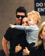 Mission Impossible Star Paula Patton Carries Her Son Through LAX