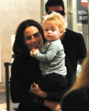 Mission Impossible Star Paula Patton Carries Her Son Through LAX