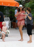Amadeus Becker Keeps Mom Busy On Christmas By The Pool