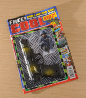 Police call for 'realistic' toy gun being sold with children's comic to be withdrawn, Britain - 21 Dec 2011