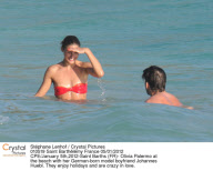 CPE/Olivia Palermo at the beach with her German-born model boyfriend Johannes Huebl.
