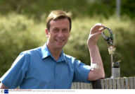 PROFESSOR KEVIN WARWICK AND HIS CYBERNETIC ARM AT READING UNIVERSITY, BRITAIN - 2002