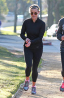 Actress REESE WITHERSPOON out jogging with a friend in Brentwood
