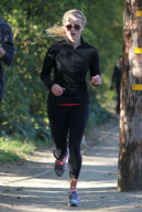 Actress REESE WITHERSPOON out jogging with a friend in Brentwood