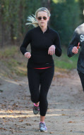 Actress REESE WITHERSPOON out jogging with a friend in Brentwood