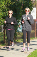 Actress REESE WITHERSPOON out jogging with a friend in Brentwood