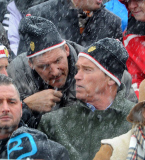 ARNOLD SCHWARZENEGGER watching the world famous Hahnenkamm ski race in Kitzbuhel