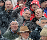 ARNOLD SCHWARZENEGGER watching the world famous Hahnenkamm ski race in Kitzbuhel