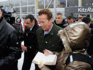 ARNOLD SCHWARZENEGGER watching the world famous Hahnenkamm ski race in Kitzbuhel